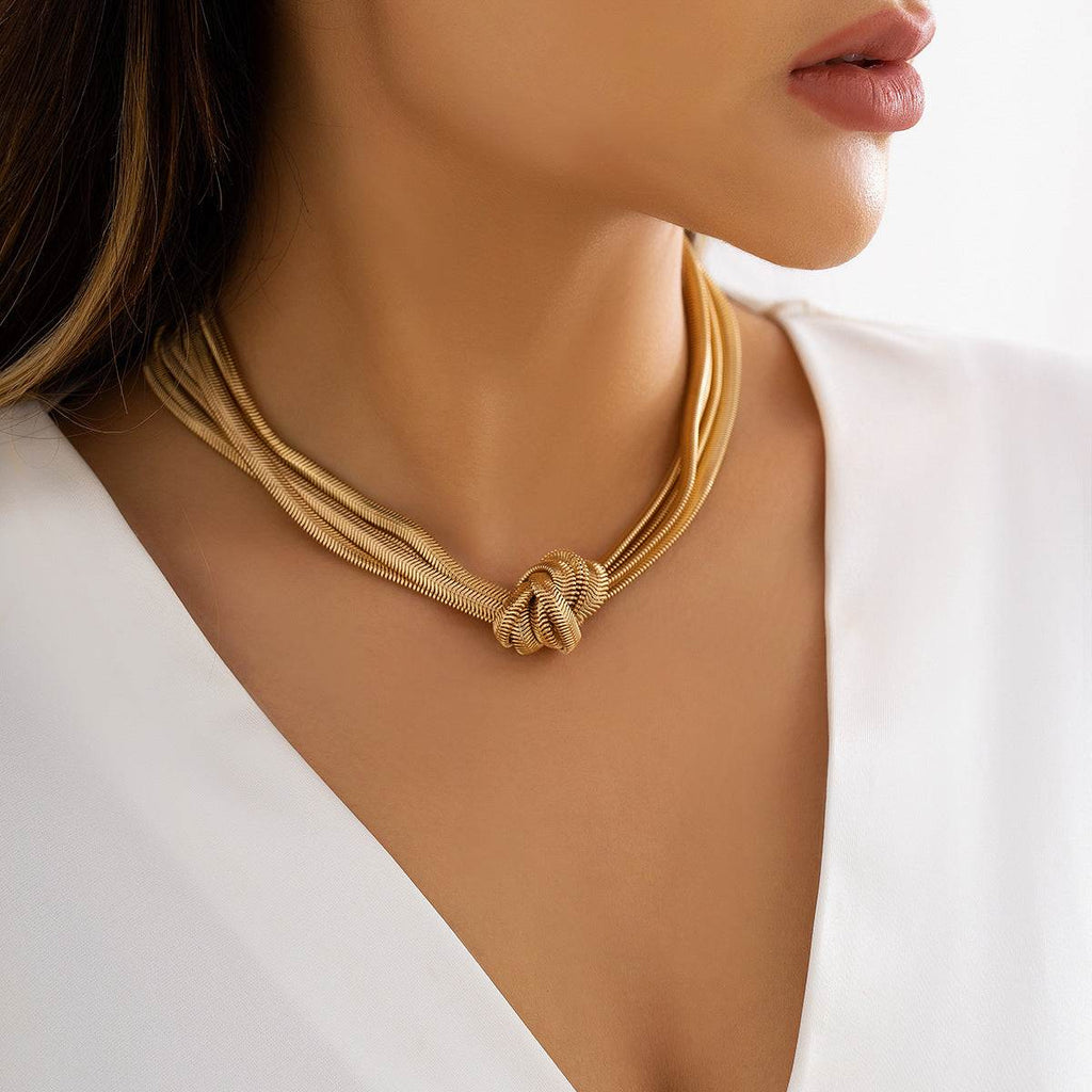 Gold knot necklace for women, elegant layered choker with textured chains, perfect for everyday elegance and style