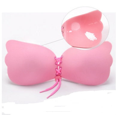 Pink strapless bra with lace-up front and soft silicone cups for comfort and support