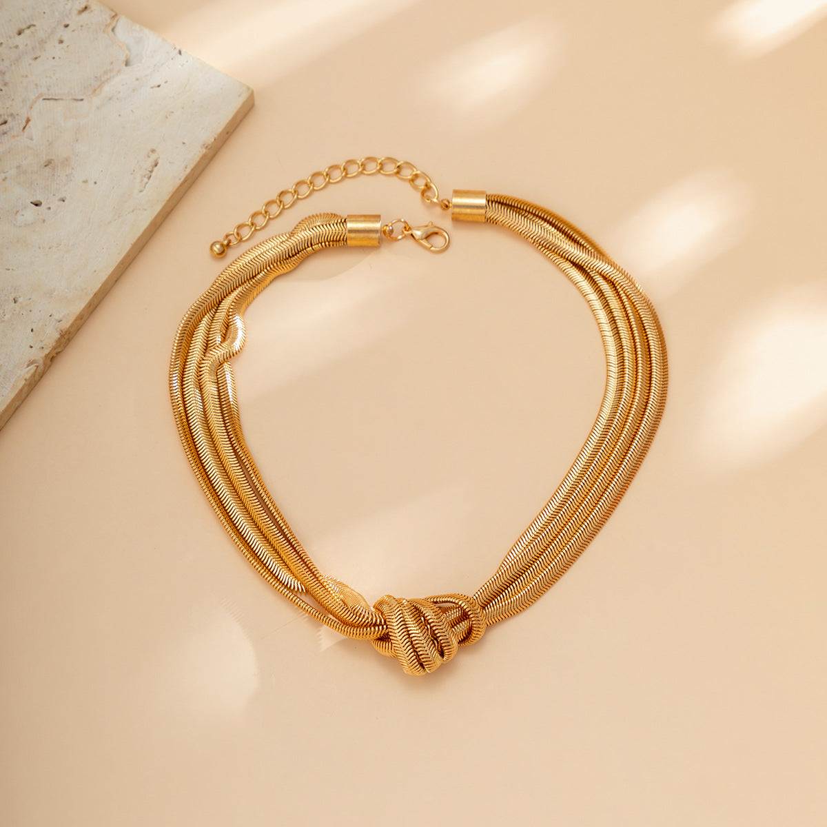 Gold knotted multi-layer snake chain necklace for women's everyday elegance