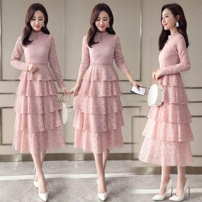 Pink lace tiered maxi dress with long sleeves, perfect for elegant everyday wear and special occasions.