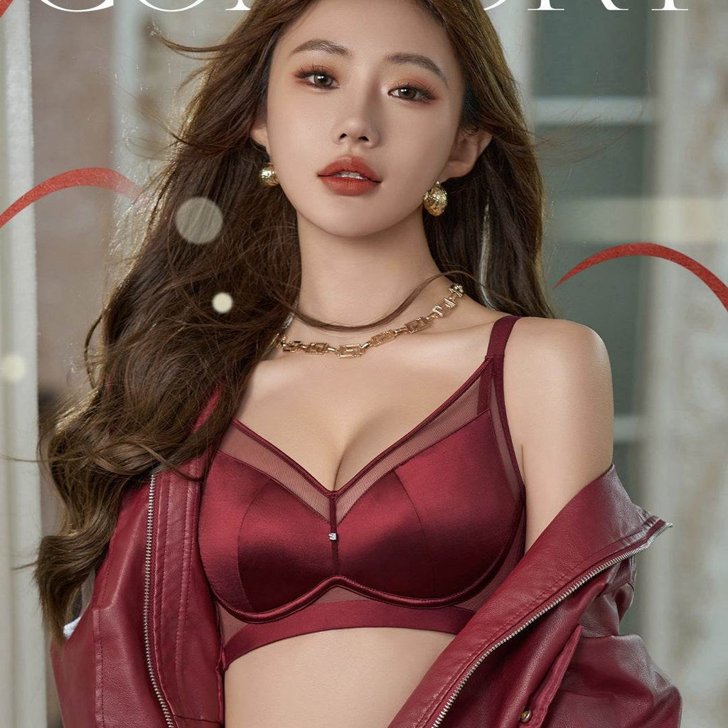 Red satin lingerie bra with sheer mesh detailing, paired with matching jacket for elegant everyday wear.