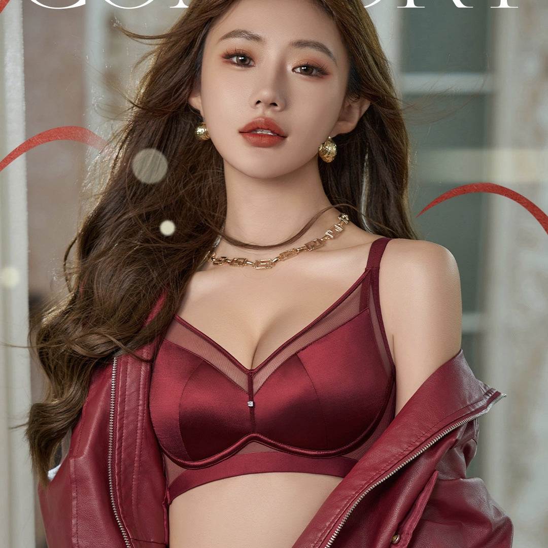 Red satin lingerie bra with sheer mesh detailing, paired with matching jacket for elegant everyday wear.