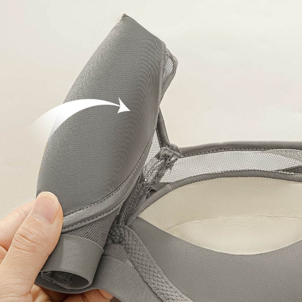Gray seamless bra with mesh detailing and adjustable strap for comfort and support