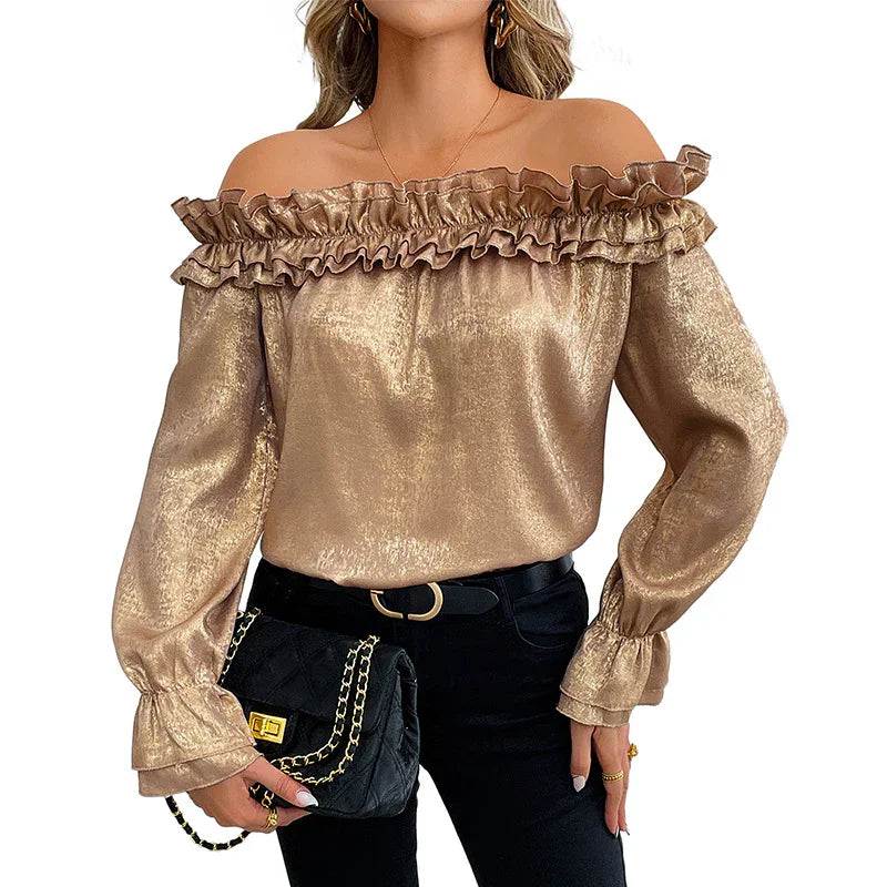 Gold off-shoulder ruffle blouse with long sleeves, paired with black jeans and chain bag for elegant women's fashion