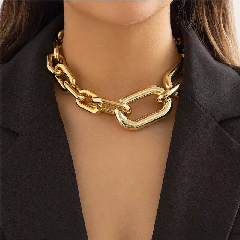 Gold chunky chain necklace for women, styled with black blazer for elegant everyday wear