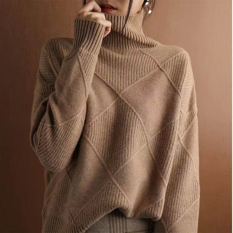 Cozy beige turtleneck sweater with diamond knit pattern, perfect for everyday elegance and comfort.