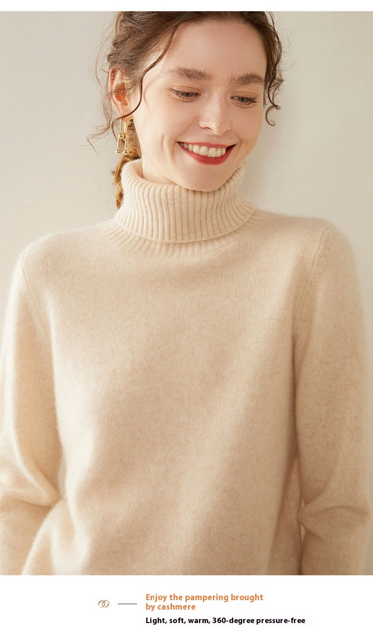 A woman smiling while wearing a soft, thick beige Laylace cashmere turtleneck sweater for winter.