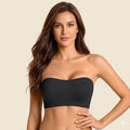 Laylace black wireless strapless bandeau bra with seamless construction and non-slip silicone grip on a model