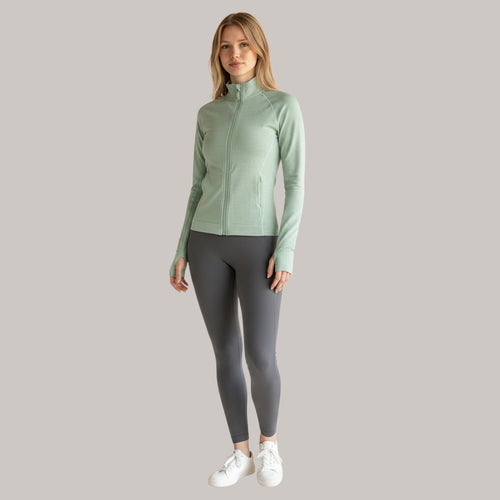 Laylace mountain blue green seamless yoga cardigan with long sleeves and thumbholes worn by a model