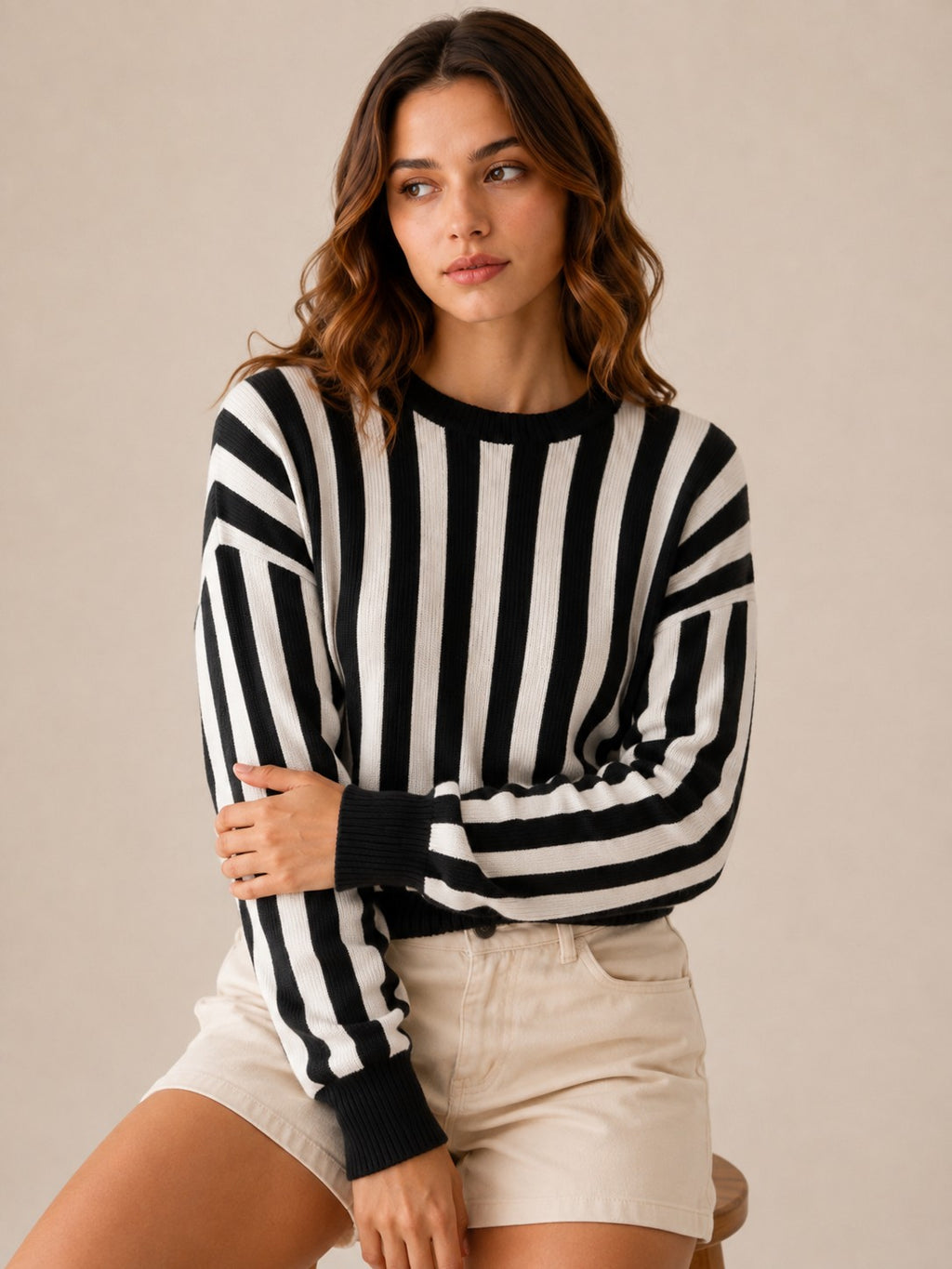 Laylace women's black and white vertical striped long sleeve knit pullover sweater worn by a model