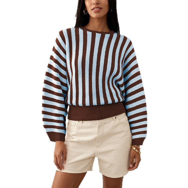 Laylace model wearing a brown and light blue vertical striped long-sleeve knitted pullover sweater