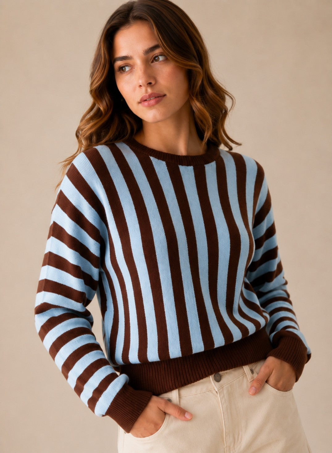 Laylace women's long-sleeve knit sweater featuring vertical brown and light blue stripes and a ribbed hem.